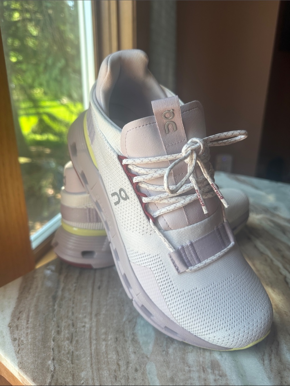 On  Cloud Nova Running Women's Sneakers in White /Lavender/Yellow Accents.